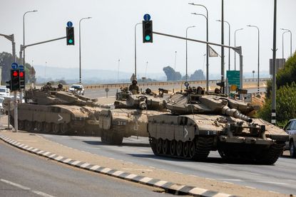 Israeli tanks rolling down the street